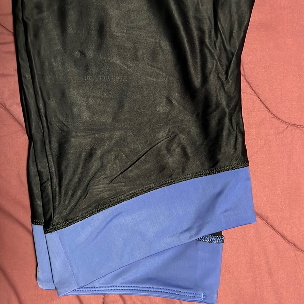 Worn a few times black cropped stretch leggings.  Color waist accent.